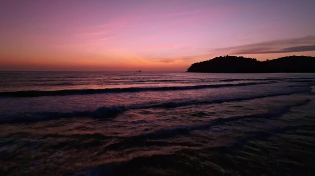 Aerial view Beautiful view sunset or sunrise over sea surface beautiful wave Amazing light twilight sky sunset. Cinematic drone shot dynamic footage beautiful light of nature seascape