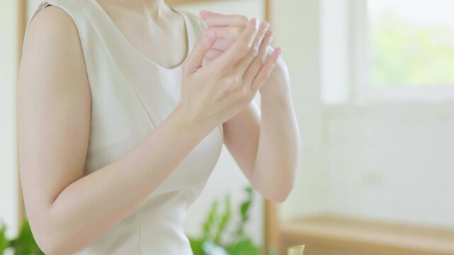 Joyful Woman Clapping in Bright Home Office Lifestyle Photography Natural Light Positive Vibes
