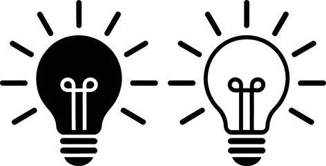 Two light bulb icons with smiling faces and rays showing creativity and ideas © Tusher