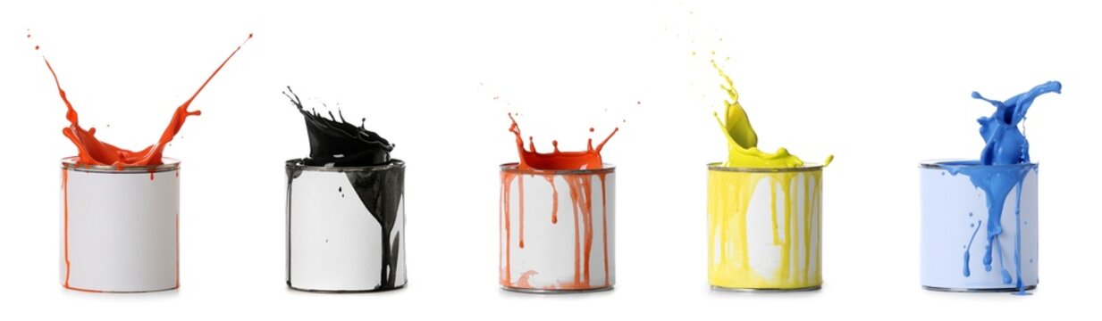 Cans of paints with splashes on white background