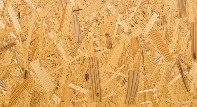 Oriented strand board OSB wood texture background natural chipboard pattern