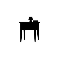 Fototapeta premium Silhouette of a wooden nightstand with a lamp and book.