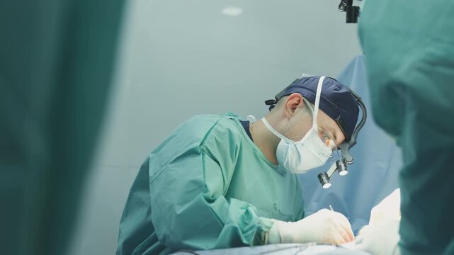 Leading surgeon man doctor suture patient incision with surgical medical thread using medicine instruments group of nurses assisting nursing operation male practitioner working health care clinic