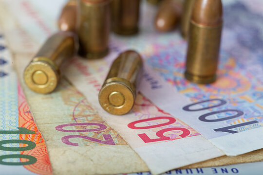 Crime in South Africa, Rand Banknotes with 9mm Pistol Ammunition copper-plated projectiles