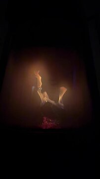 A slow burning fire in the fireplace
