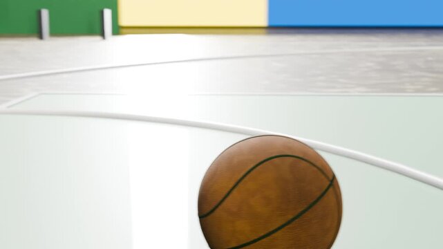 Entering from top-right, basketball descending and bouncing on gym court toward painted arc