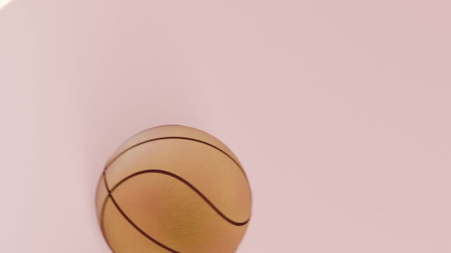 Uncovering lens showing orange ball bouncing through hole, rolling along pink panel with white line