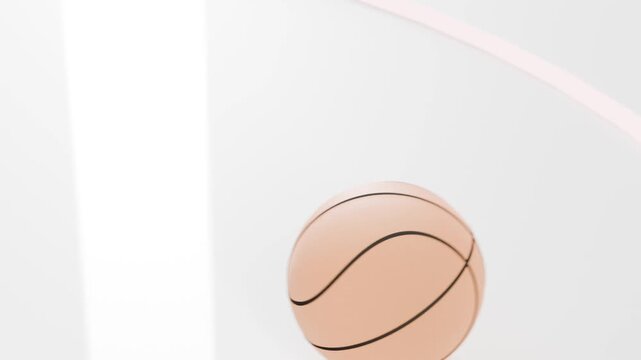 Dropping peach basketball rolling and rotating on glossy panel in studio, tracing pink motion trail