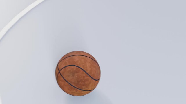 Passing through circular hole, brown basketball rolling on glossy white platform, coming to rest