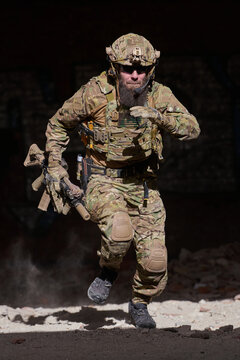 Special Forces Soldier Running With Tactical Gear And Rifle During Urban Combat Training Mission