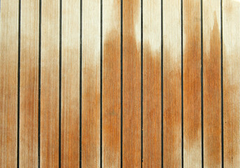 Obraz premium Wet wooden deck of luxury yacht background texture