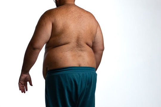 Overweight man from behind showing abdominal weight