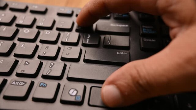 Top View Man Pressing Ctrl Plus on Keyboard for Zoom In Shortcut on Computer