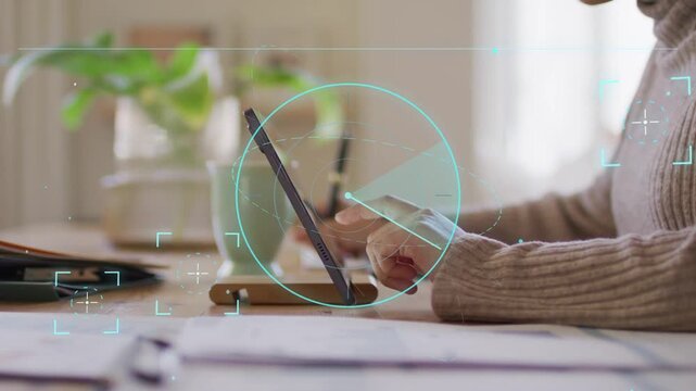 Woman tapping tablet while colleague holding pen, swiping rotating HUD navigating UI for tech demo