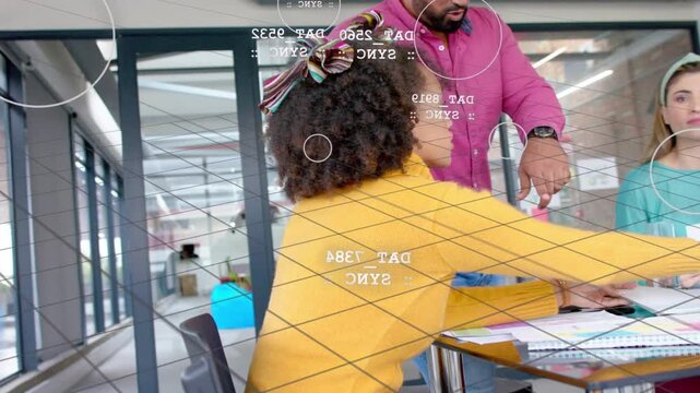 Yellow-sweater woman sorting papers as speaker showing sheet, AR grid linking swatches for design