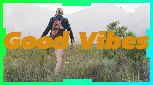 Female hiker walking toward hazy peaks, glitch bars flashing and frame revealing Good Vibes travel