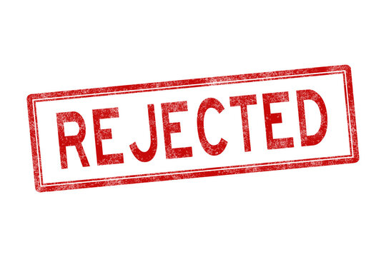 Rejected red distressed stamp isolated on white