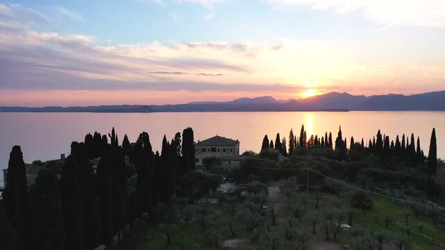 Punta San Vigilio, Garda Lake at sunset, aerial view. Italy