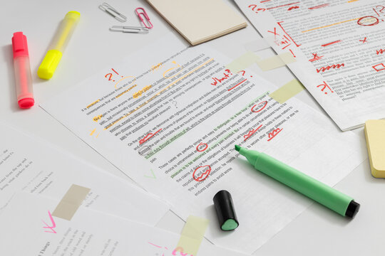 Improving writing skills through editing and revision, marking errors and refining text for better readability and structure