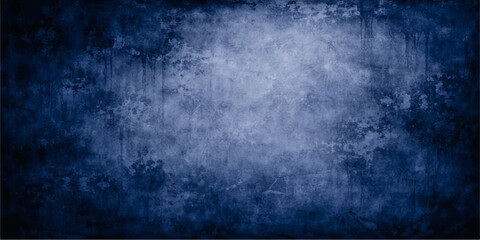 Obraz premium A dark blue grunge wall texture backdrop featuring vintage paper patterns with smoke and fog clouds under a black storm sky