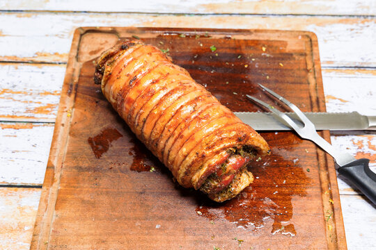 Porchetta ready to be cut when cooked on the barbecue