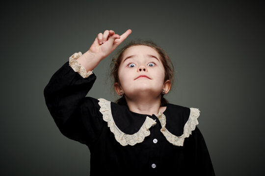 Curious Pointing Girl
