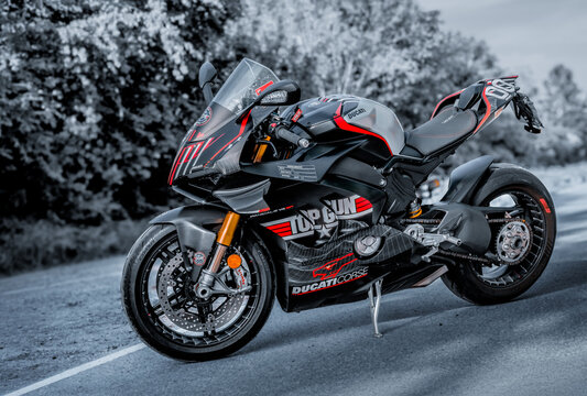 Ducati Panigale V4 SP2 special edition superbike side view on country road