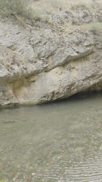 Scenic river flowing through a rocky canyon gorge
