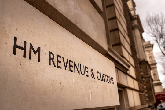 LONDON - HM Revenue & Customs stone sign Whitehall Parliament Street government building