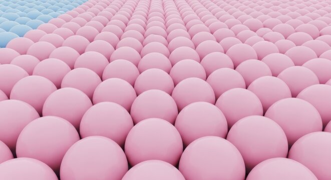 Rows of pink balls arranged in a pattern with blue balls in the background