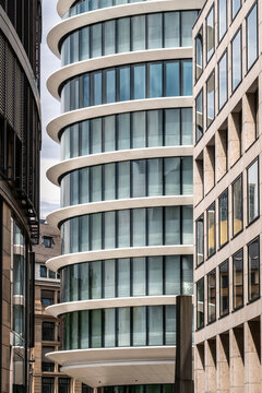 Modern architecture building facade windows curved urban office Bankenviertel Frankfurt finance district with contemporary exterior and clean lines
