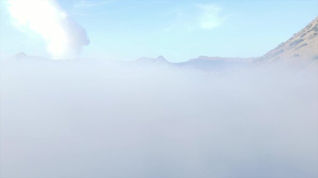Stunning 4K wide shot of Mount Bromo volcano erupting smoke above a thick sea of clouds at dawn.