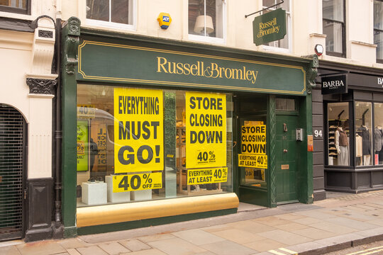 LONDON - Jermyn Street St James Russell & Bromley store closing down sale signs 40 percent off
