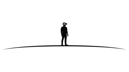 Fototapeta premium silhouette of a man standing using VR