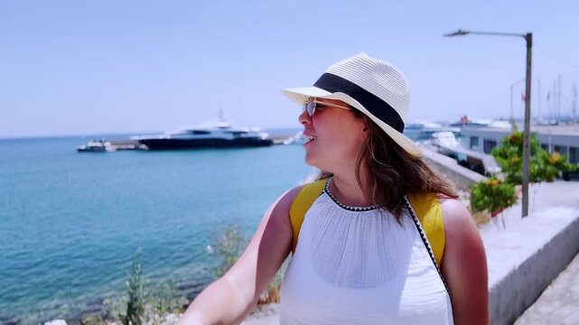 Influencer vlogging about piraeus harbor summer vacation