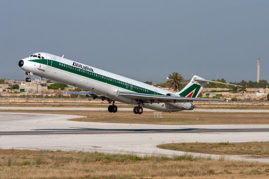 Luqa, Malta - July 17, 2007: Alitalia McDonnell Douglas MD-82 (DC-9-82) (REG: I-DAWO) taking off from runway 31.