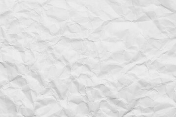 Naklejka premium White crumpled paper texture background,Macro,High angle view of white crumpled paper texture background, full frame. Detailed surface of creased and wrinkled paper for background and design elements.