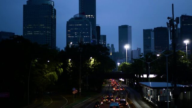 Morning atmosphere on busy Sudirman Street, Jakarta. 
