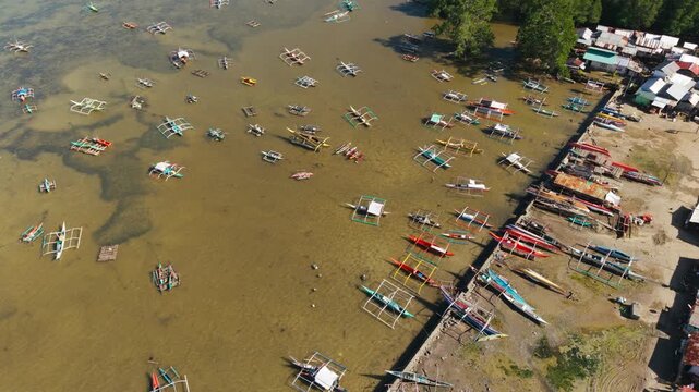 Boats near shore Tagburos Puerto Princesa Palawan Philippines coastal area