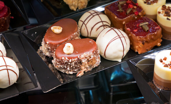 Sweet chocolate cakes inside store shelf interior