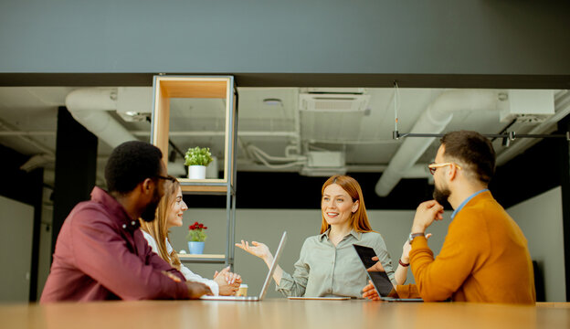 Engaging team discussion in a modern office space during creative brainstorming