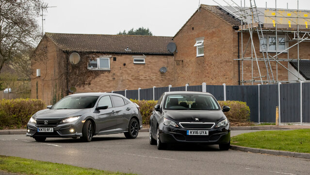 Milton Keynes,Bucks,UK - Mar 5th 2026:  car parked on the corner of a British road forcing other drivers on to the wrong side of the road and blocking their view