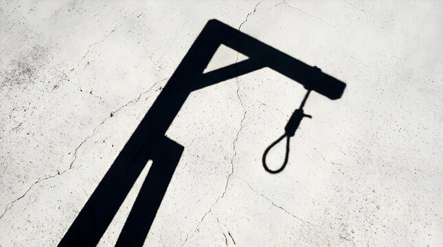 Dramatic Dark Shadow of a Gallows and Noose on Cracked Concrete Ground Surface