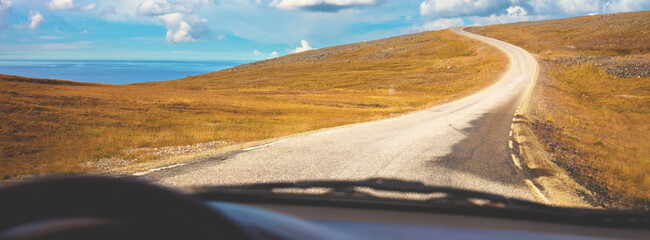Landscape with mountain road. The arctic road to Nordkapp. Lapland, Norway © vvvita