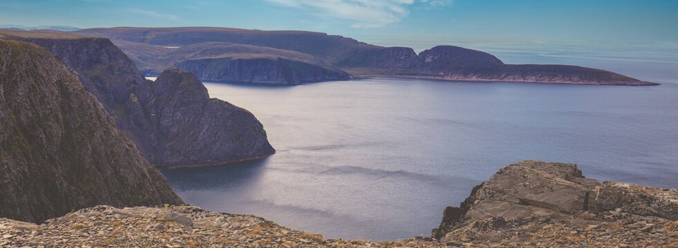 The Barents Sea at sunset. The rocky coast. Beautiful landscape. Northern Cape. North Cape, Norway