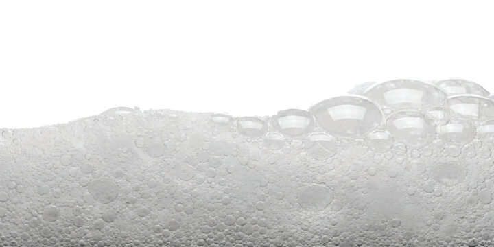 Close up of soap bubbles floating in water texture creating a soft foam layer with round circle shapes