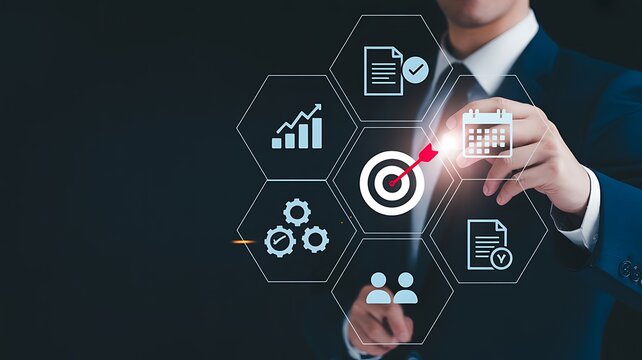 Goal setting and strategic focus using digital interface. businessman selecting target icon and strategy dashboard. strategic planning, performance tracking and digital business management for success