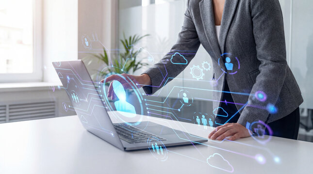 Digital HR management concept with businesswoman using laptop and virtual employee network interface.
