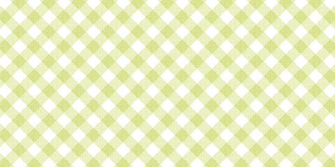 Textured diagonal lime green gingham checkered pattern, a seamless fabric background with a rustic tilted check for packaging design. © Dunzz