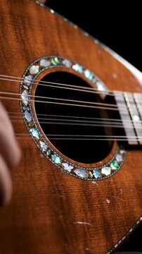 Close up of guitar soundhole and decorative rosette